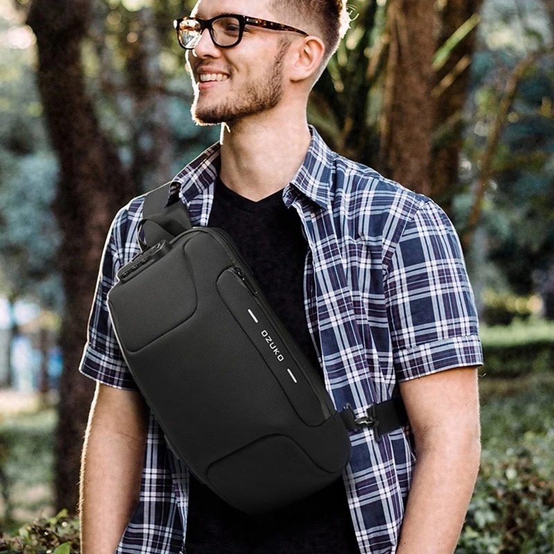 Túi đeo chéo không thấm nước chống trộm có cổng USB thời trang nam