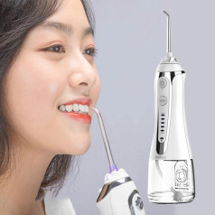 Máy tăm nước kèm 5 đầu tăm tiện dụng