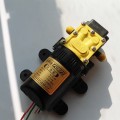 Máy bơm nước mini tăng áp 12V tưới cây, rửa xe đa năng